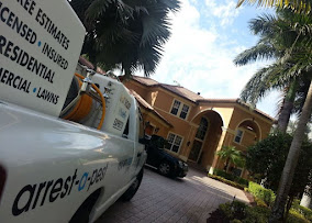 Arrest-A-Pest truck servicing a South Florida home